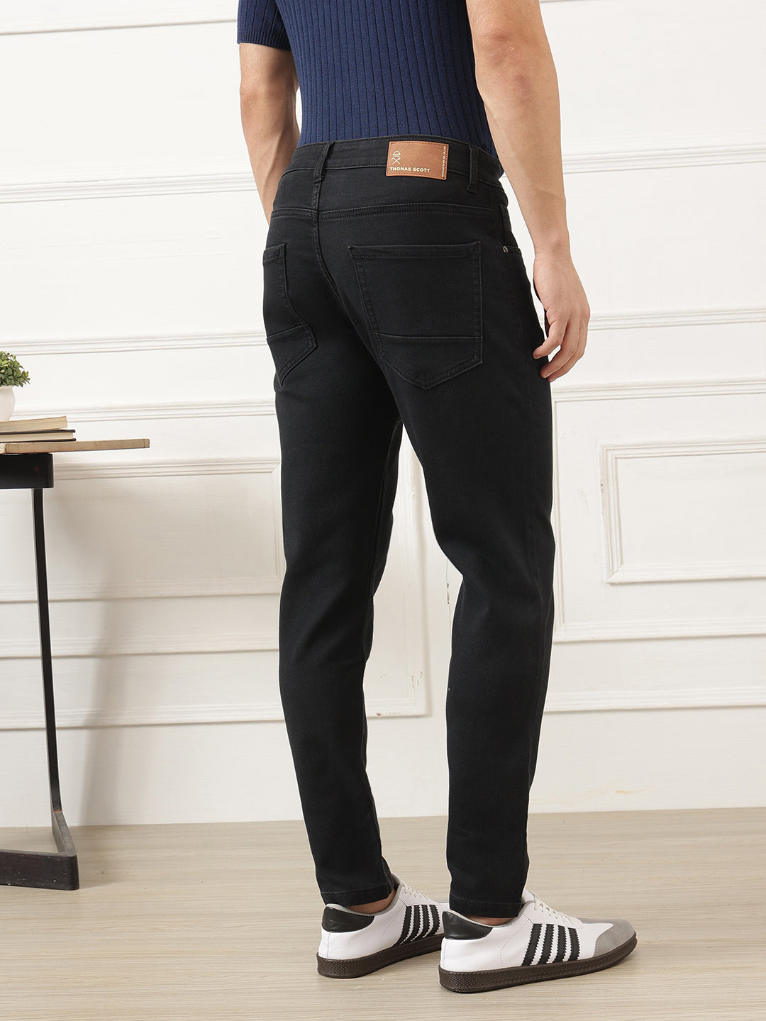 Black Smart Carrot Fit Mid-Rise No Faded Clean Look Stretchable Jeans For Men