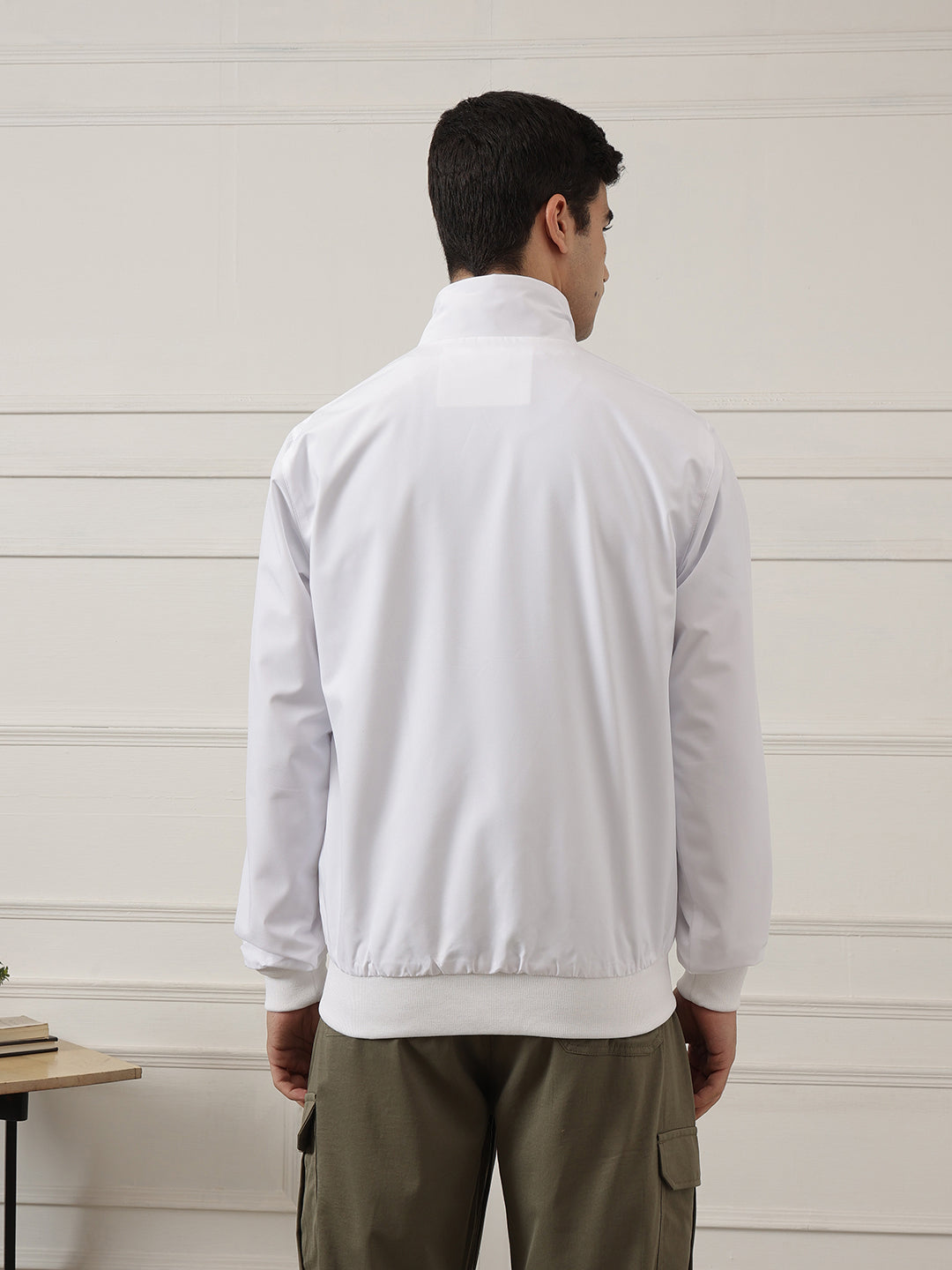 White Regular Fit Solid Full Sleeves Stand Collar Zip-Front Casual Bomber Jacket For Men