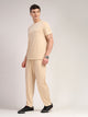 Beige Round Neck Relaxed Fit Solid Polyester Co-Ords Set For Men