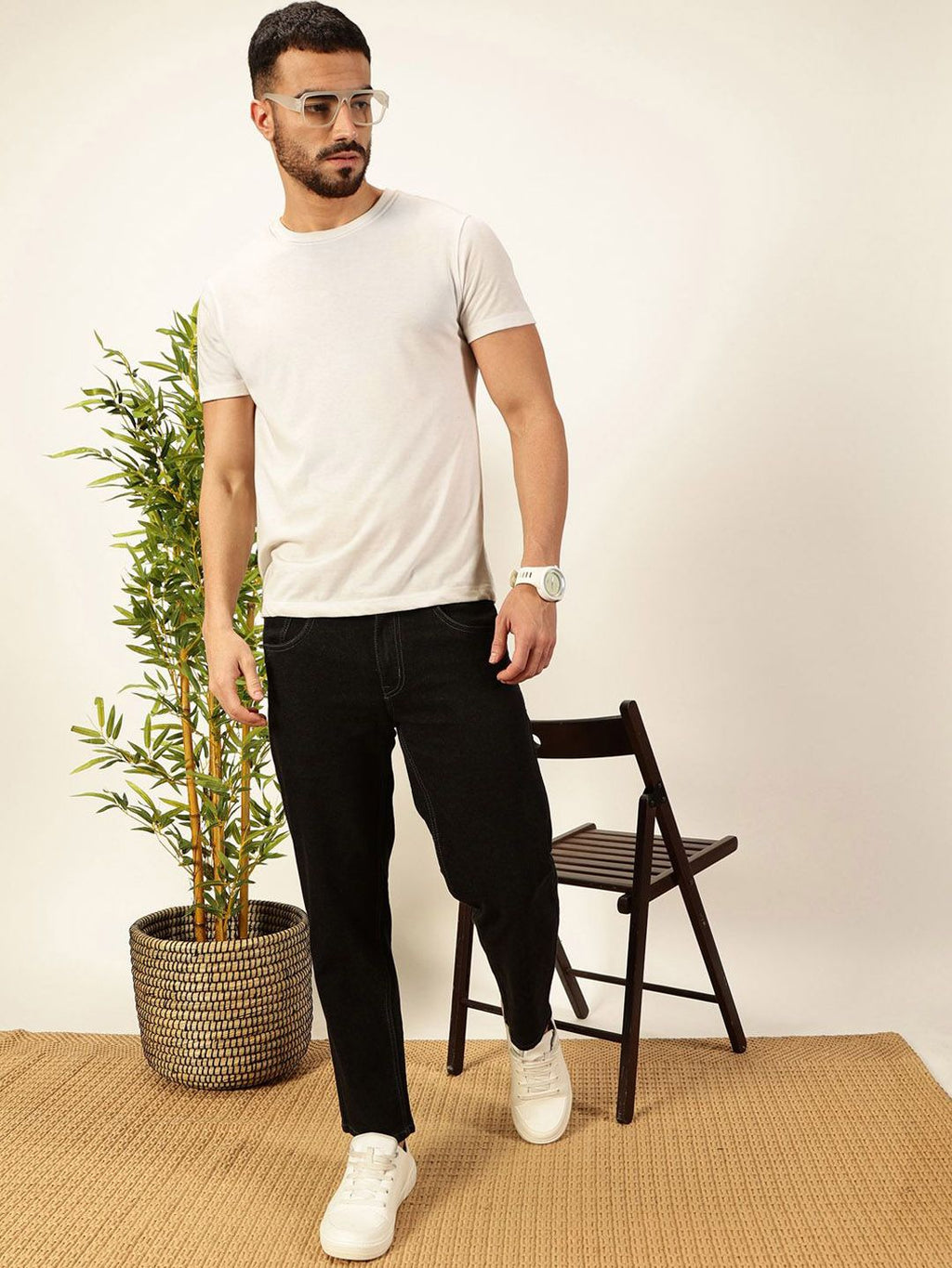 Black Smart Tapered Fit Mid-Rise Clean Look Cropped Stretchable Jeans For Men