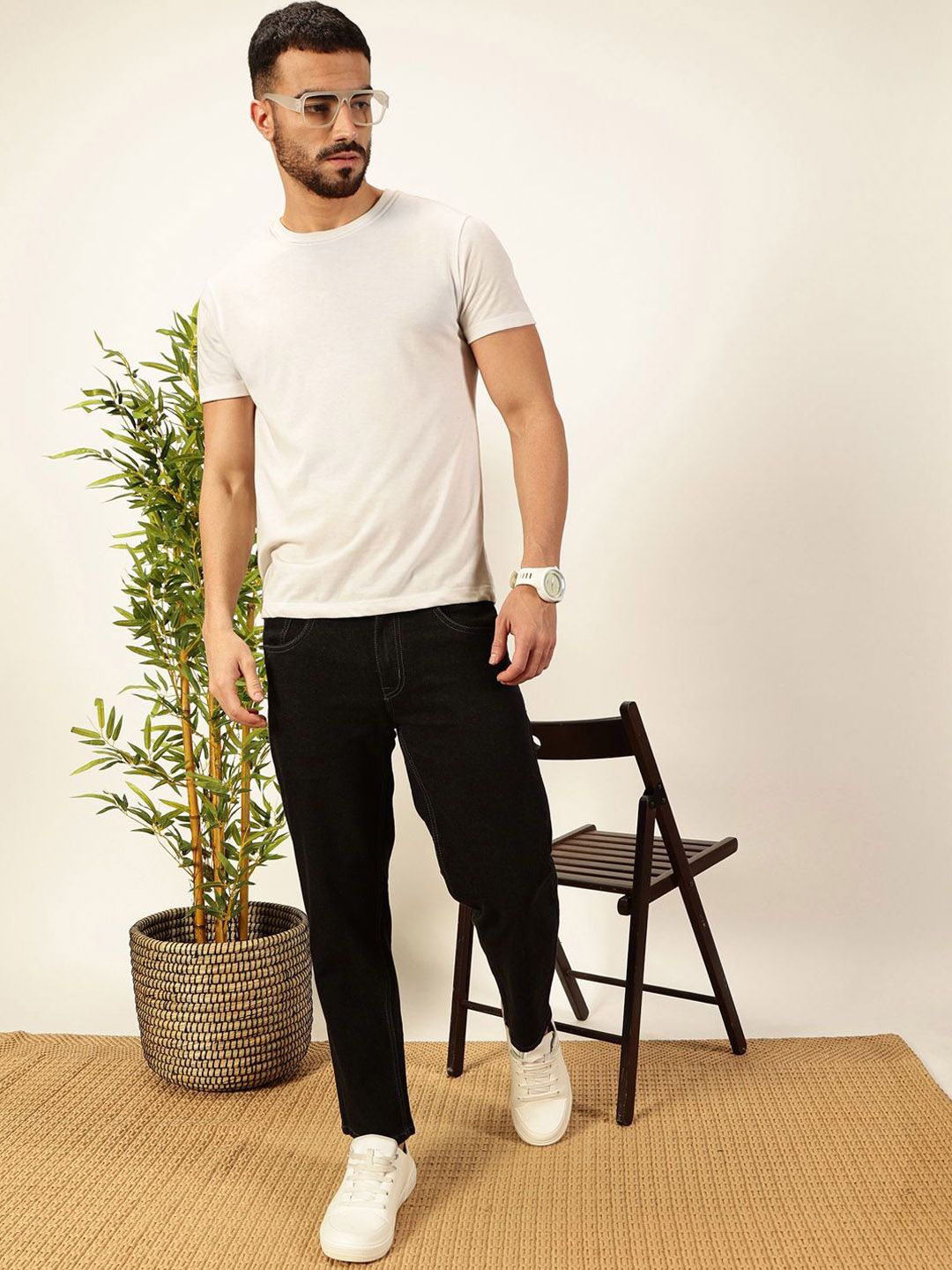 Black Smart Tapered Fit Mid-Rise Clean Look Cropped Stretchable Jeans For Men